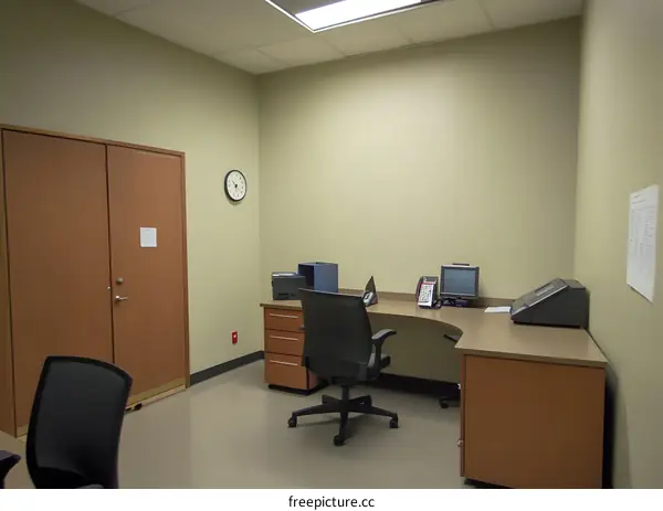 Empty Office Room with Desk and Chair