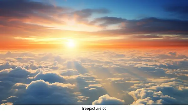 Beautiful sunset view from above the clouds