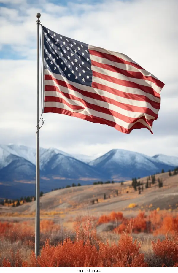 Majestic American Flag Flying High Over Mountains