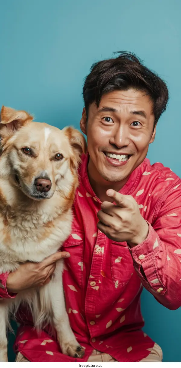 Comedian and actor Randall Park poses with his dog Otis