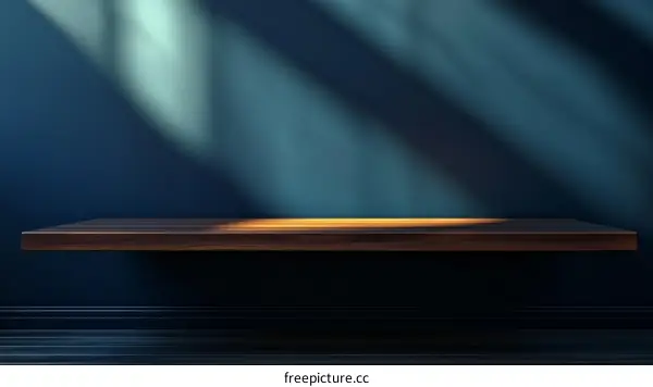 Empty Wooden Shelf Against Dark Teal Wall