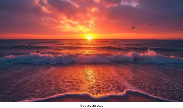 Beautiful sunset over the ocean with a colorful sky and crashing waves