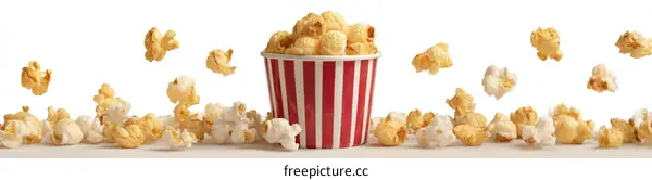 Popcorn in a red and white striped container