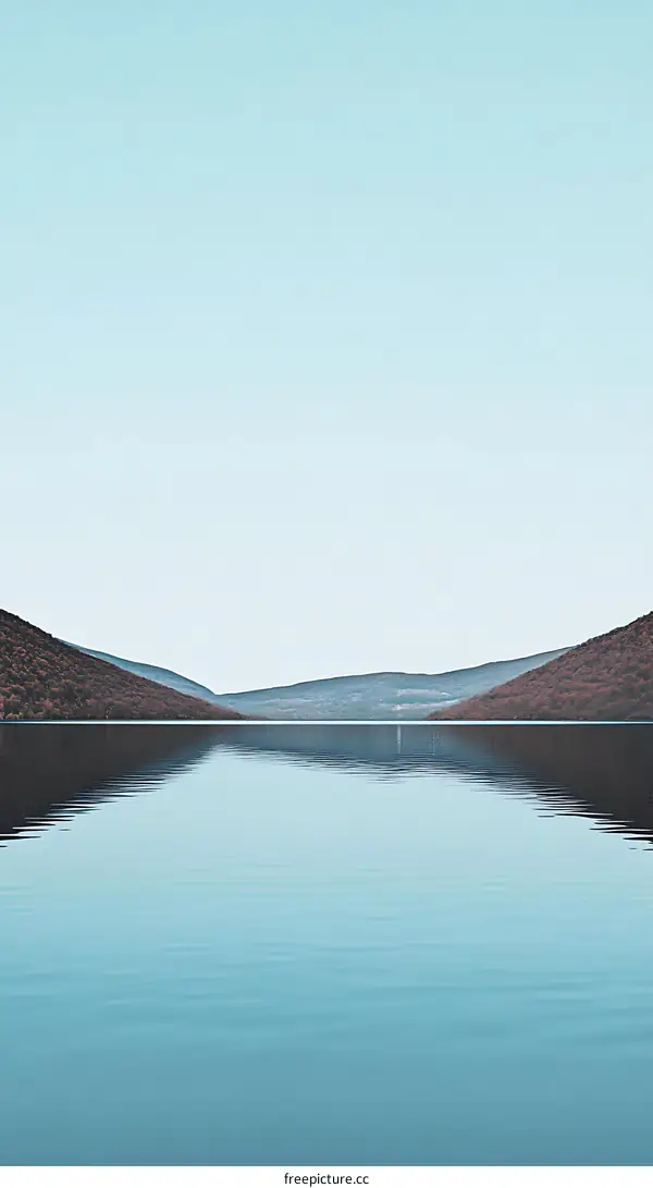 Calm Lake With Mountain Reflection
