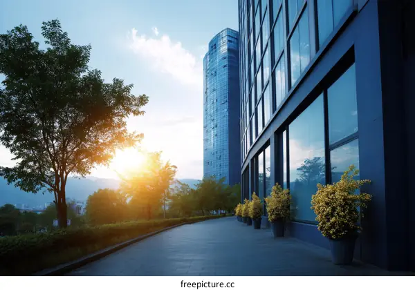 Modern Cityscape with Skyscraper and Lush Green Trees