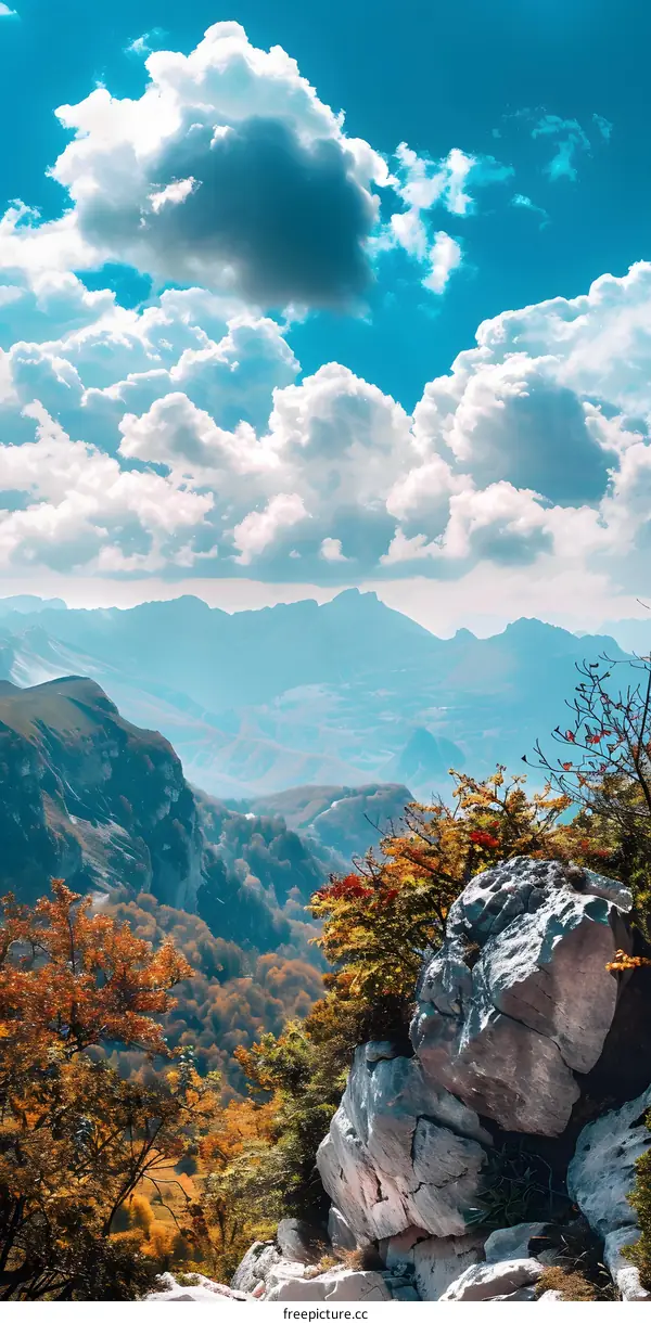 Autumn Mountain Landscape with Clouds and Blue Sky
