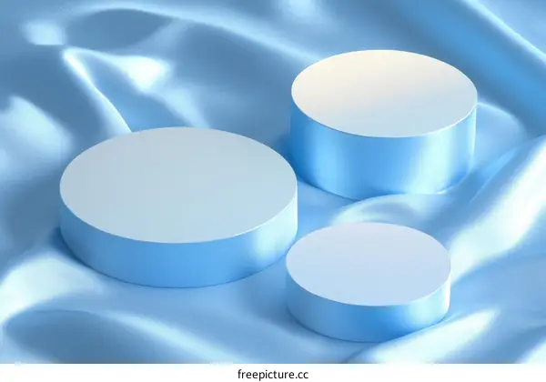 Blue Cylindrical Display Stands on Silk Fabric