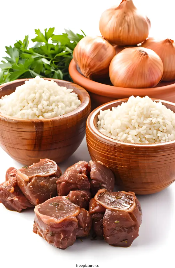Raw meat and ingredients for pilaf
