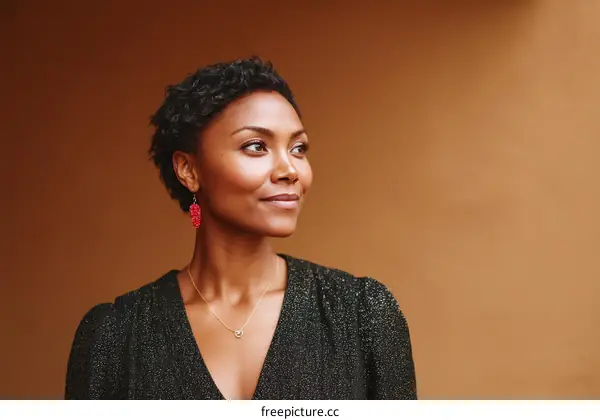 Woman in Profile with Elegant Dress and Jewelry