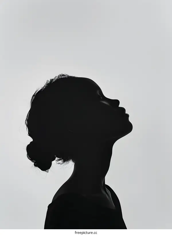 Black and white portrait of a woman in profile