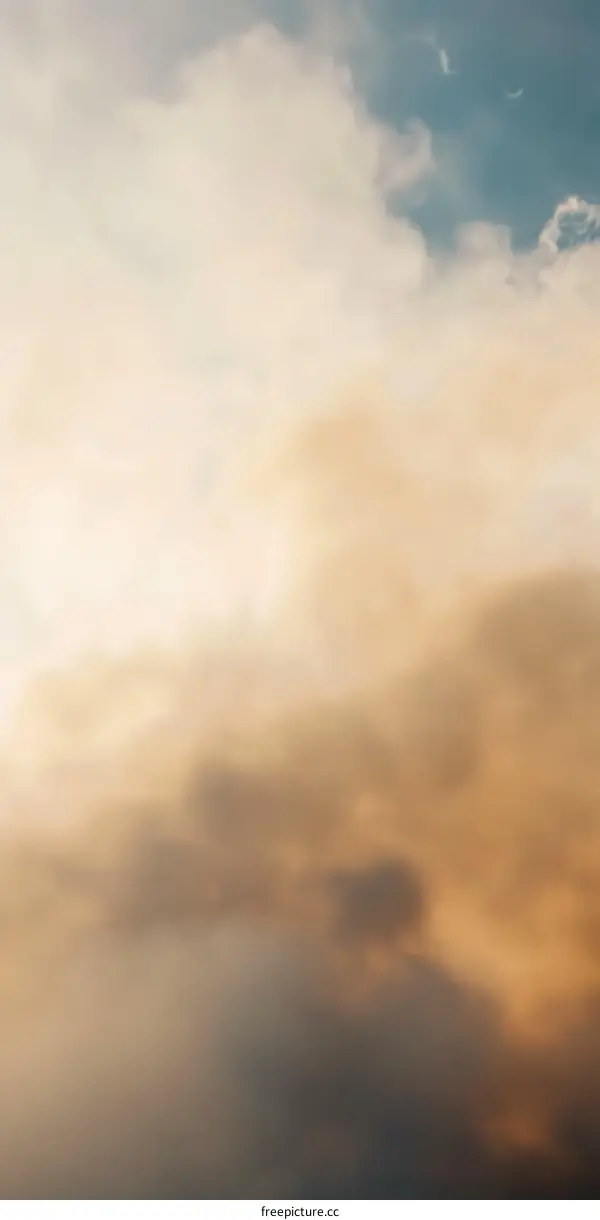 Cloudy Sky At Sunset With Orange Hues