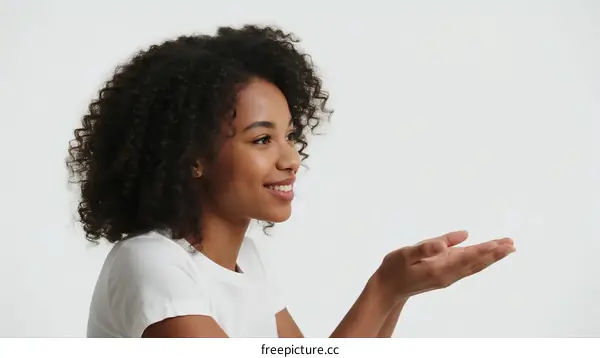 Young African American Woman Gesturing While Smiling