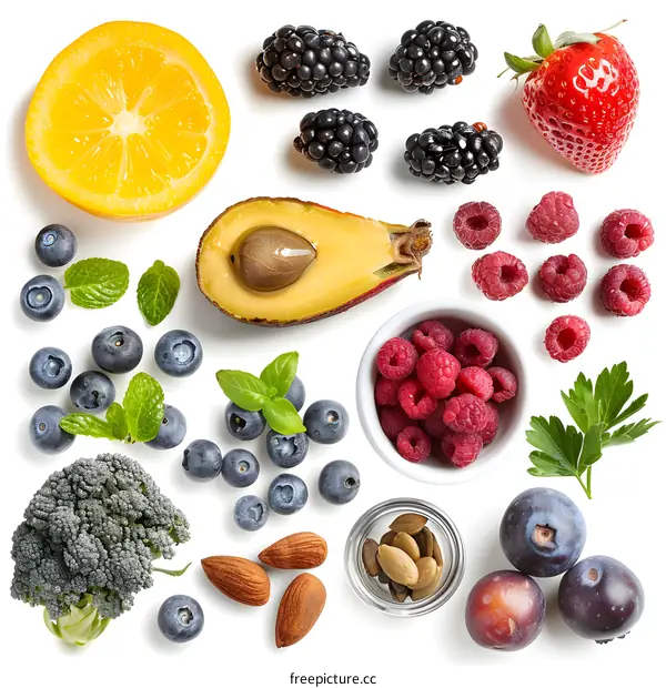 Assortment of Fresh Fruits and Vegetables Isolated on White Background