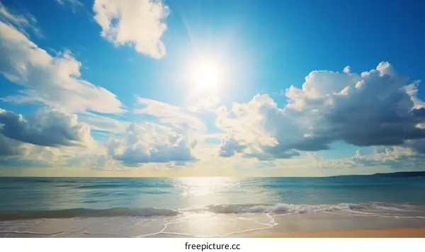 Beach with blue sky and white clouds