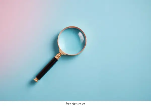 Vintage Magnifying Glass on Pastel Background