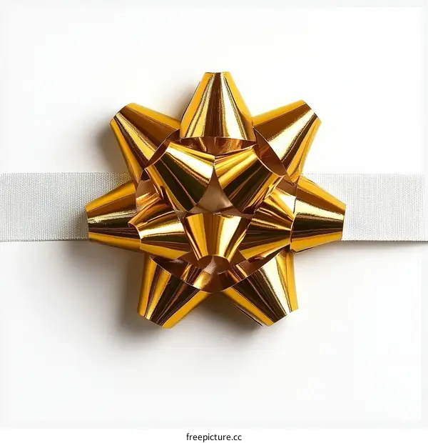 Golden Gift Bow on White Background