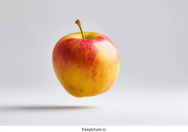 A Colorful Apple Floating in the Air