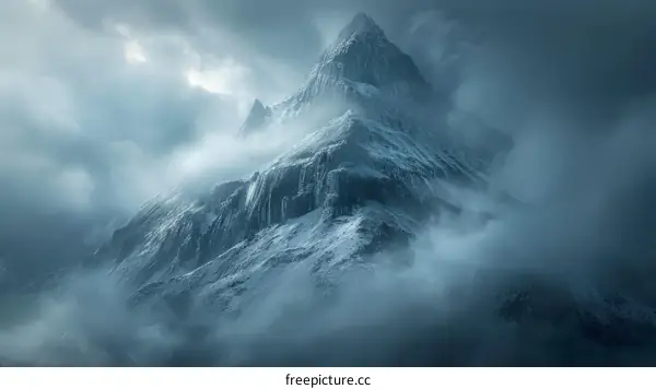 A majestic snow capped mountain peak rising above the clouds