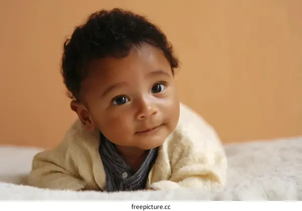 Cute Baby Girl on a Soft Blanket