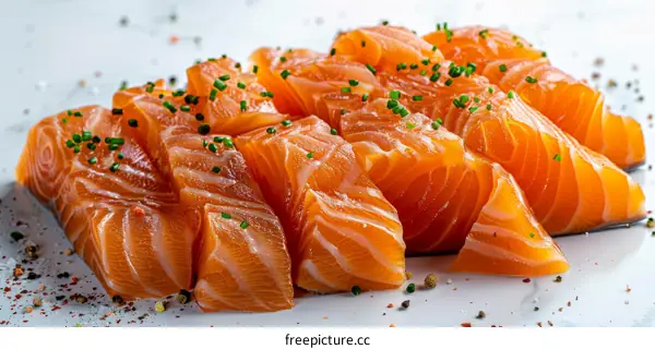 Freshly cut salmon fillet garnished with chives