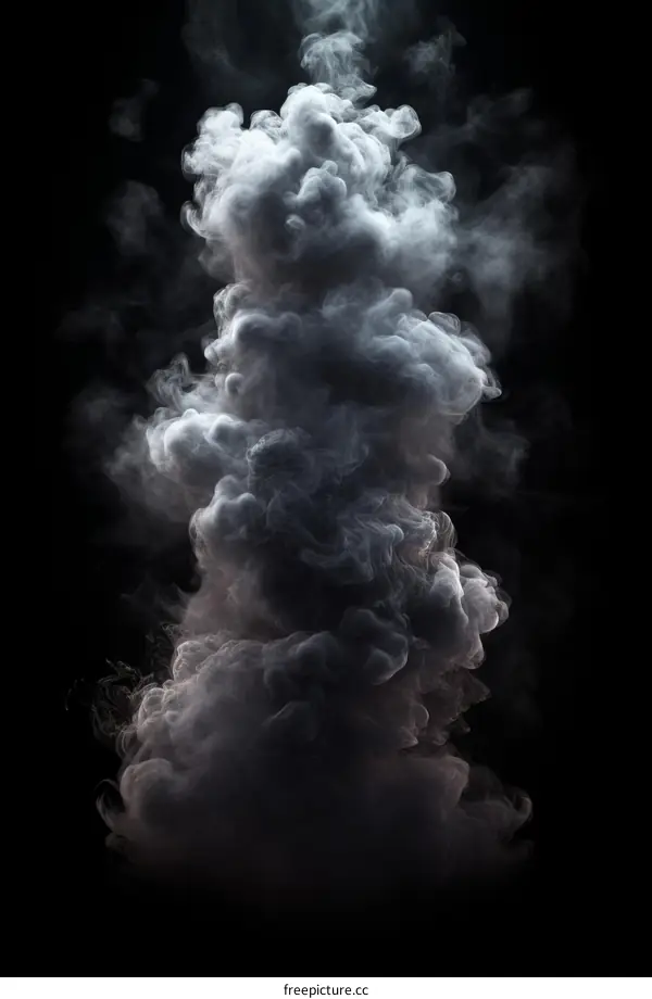 Swirling gray smoke column on black background