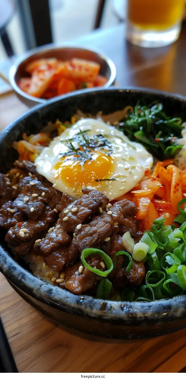 Dolsot Bibimbap: Korean Stone Bowl Rice with Beef, Egg, Kimchi & Veggies