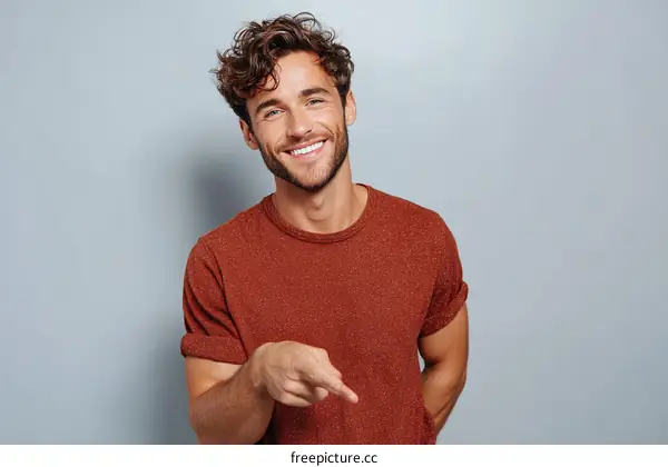 Smiling Caucasian Man Pointing
