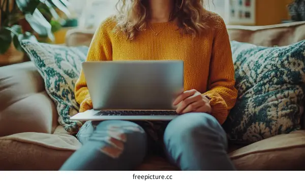 Woman Working on Laptop at Home