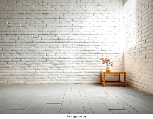 Empty Room with White Brick Wall and Wooden Floor