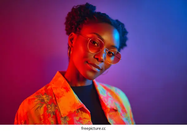 Stylish Black Woman in Vibrant Lighting