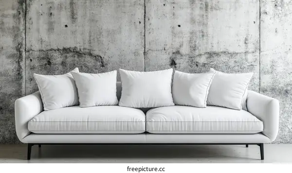 Modern White Sofa Against a Concrete Wall