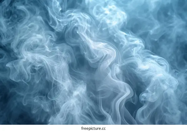 Blue smoke swirls on a black background