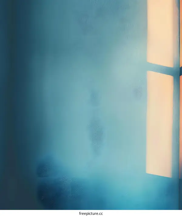 Light And Shadow On A Blue Wall