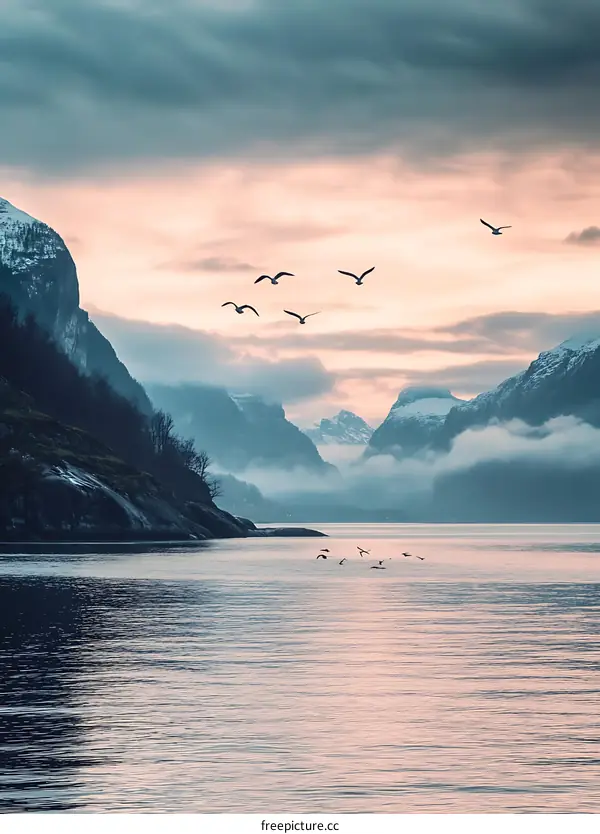 Mountain Landscape With Birds Flying Over Water