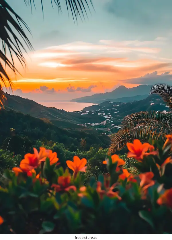 Sunset Over Lush Green Mountain Range With Orange Flowers