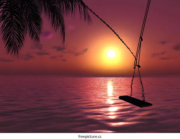 Sunset Over the Ocean with a Swing