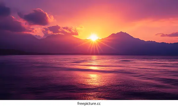 Sunset over Mountains and Sea
