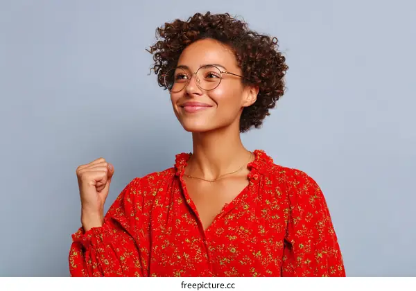 Confident Woman in Red Floral Blouse