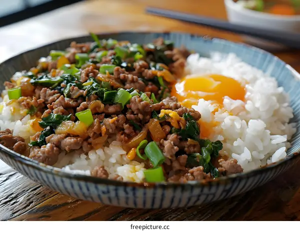 Rice bowl with minced meat and egg