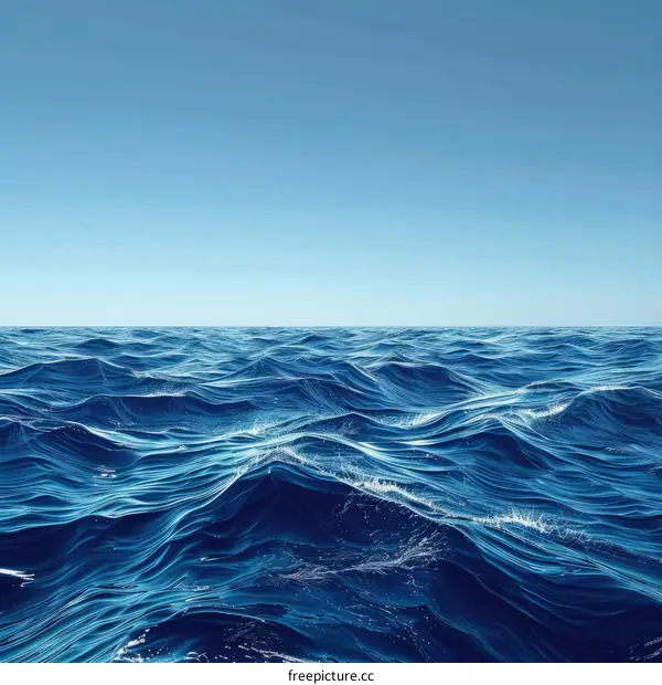 Deep blue ocean surface with gentle waves