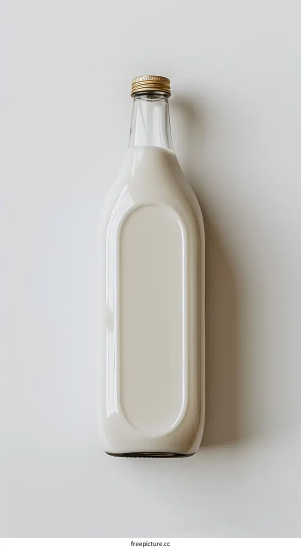 A bottle of milk on a white background