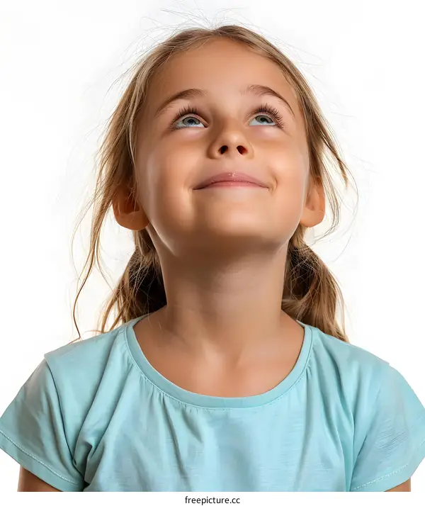 Portrait of a Smiling Little Girl Looking Up