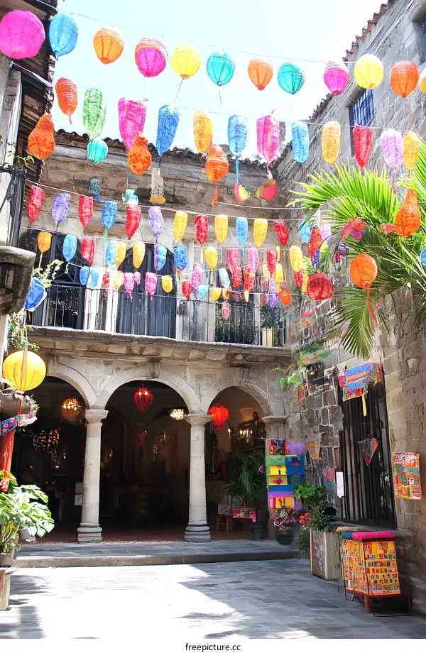 Colorful Lanterns Hanging in a Stone Courtyard