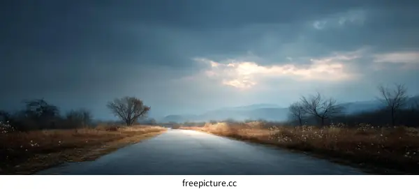 Empty Road Under Dramatic Sky