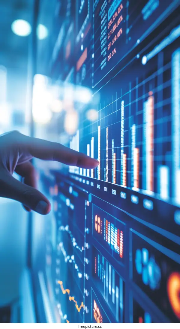 Businesswoman analyzing company data on digital screen