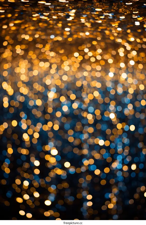 Blue and gold blurred Christmas lights background