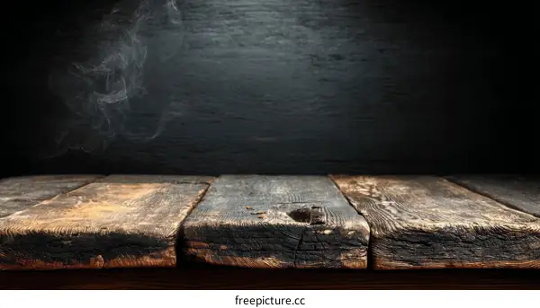 Rustic Wooden Table Top Against Dark Background