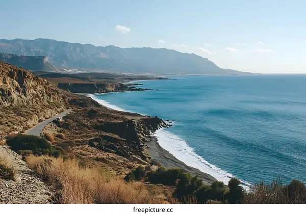 Coastal Road View with Mountain and Ocean