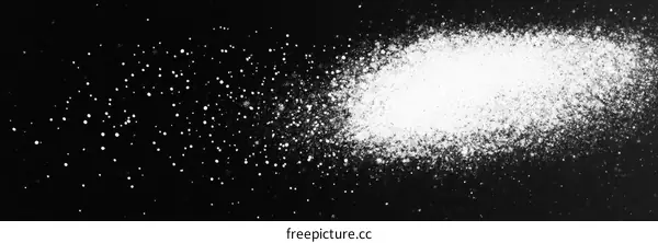 Abstract White Powder Explosion on Black Background
