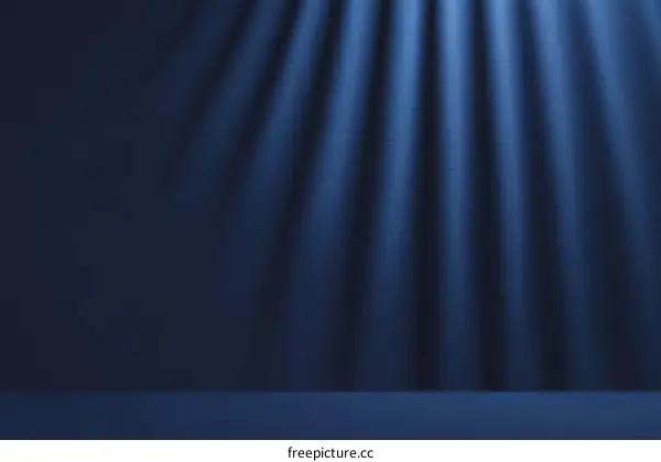 Dark Blue Studio Background with Dramatic Lighting